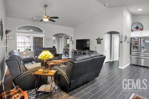Undisclosed Address Bakersfield, CA 93311 - Photo 10 of 22 a living room with furniture and flat screen tv