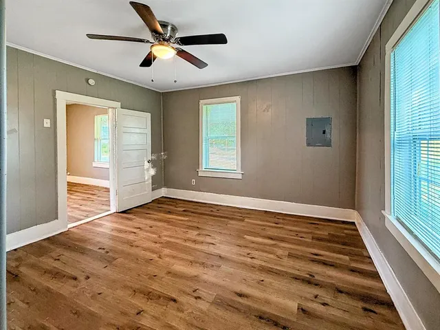 a view of an empty room with a window