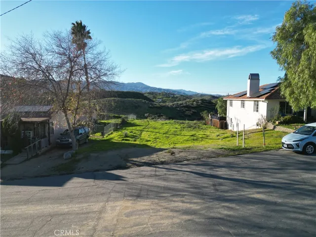 a view of a house with a big yard