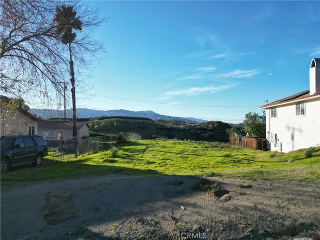 a view of a lake with a big yard