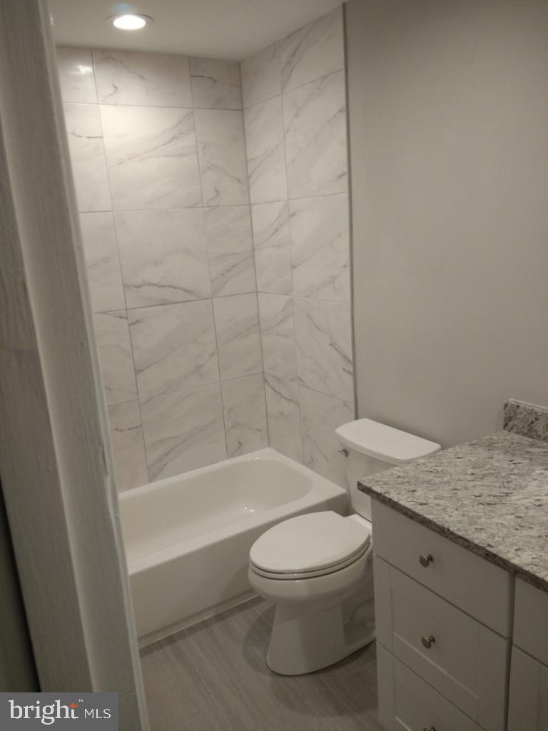 8110 Colony Point Road, Unit 222 Springfield, VA 22152 - Photo 14 of 23 Remodeled Bath