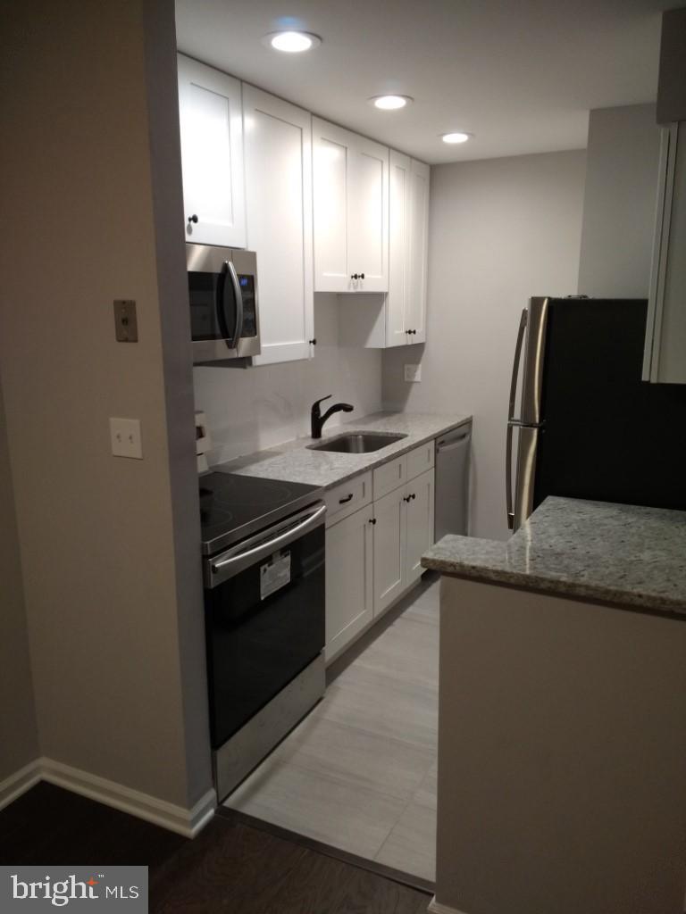 8110 Colony Point Road, Unit 222 Springfield, VA 22152 - Photo 8 of 23 Remodeled Kitchen