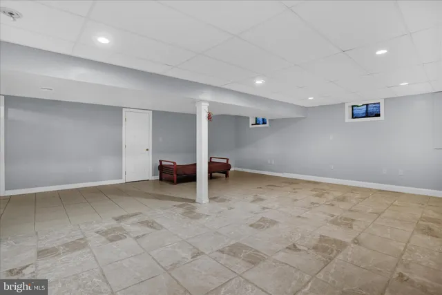 a view of a storage & utility room with chairs