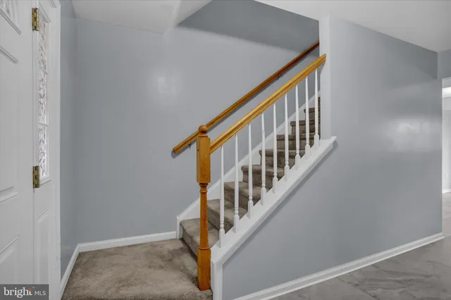 a view of an entryway with staircase