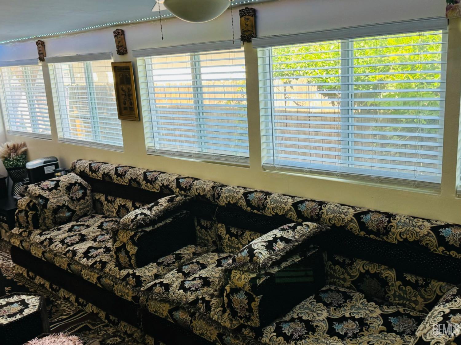 Undisclosed Address Bakersfield, CA 93313 - Photo 13 of 32 a black and white photo of a couch