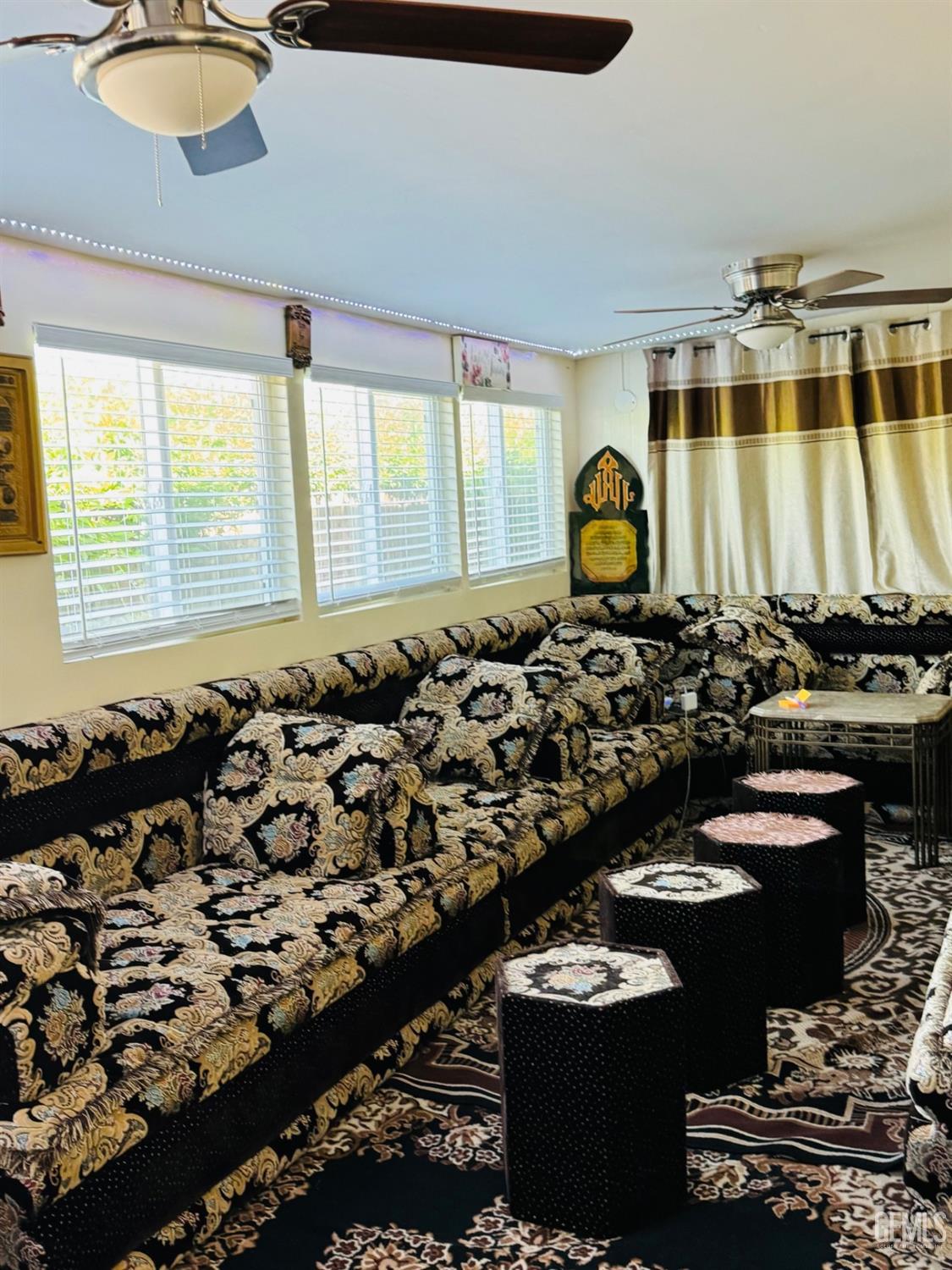 Undisclosed Address Bakersfield, CA 93313 - Photo 18 of 32 a bathroom with a sink a mirror and a shower