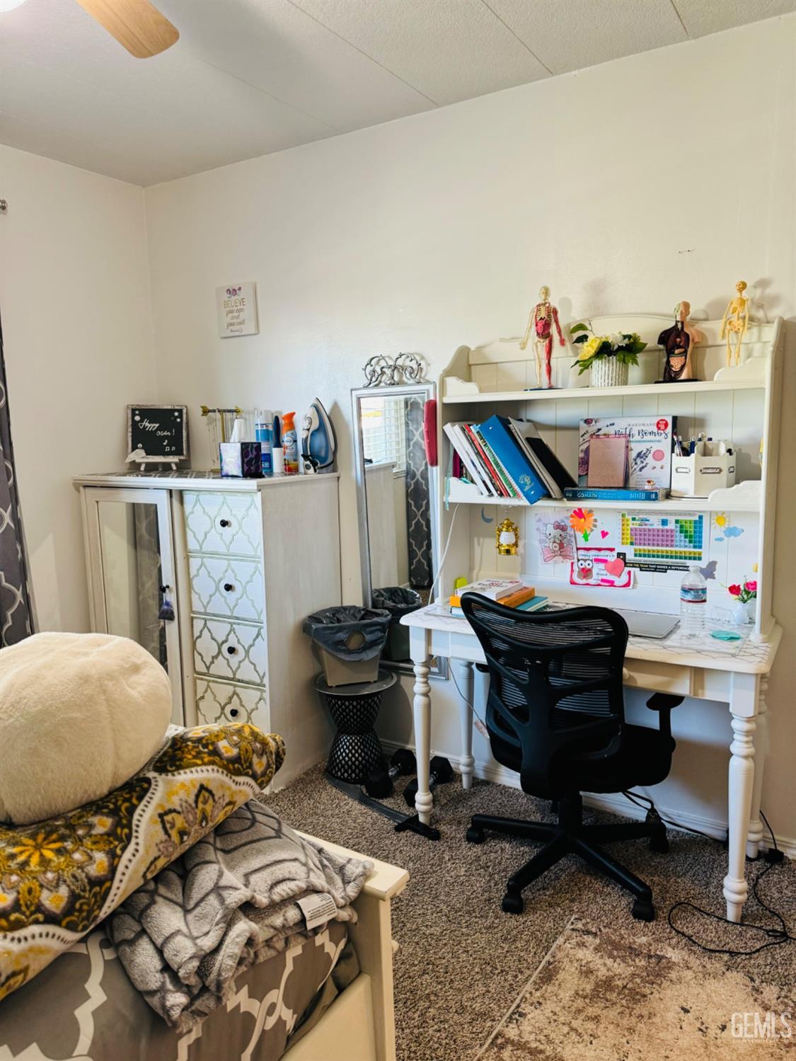 Undisclosed Address Bakersfield, CA 93313 - Photo 19 of 32 a room with furniture and a wooden floor