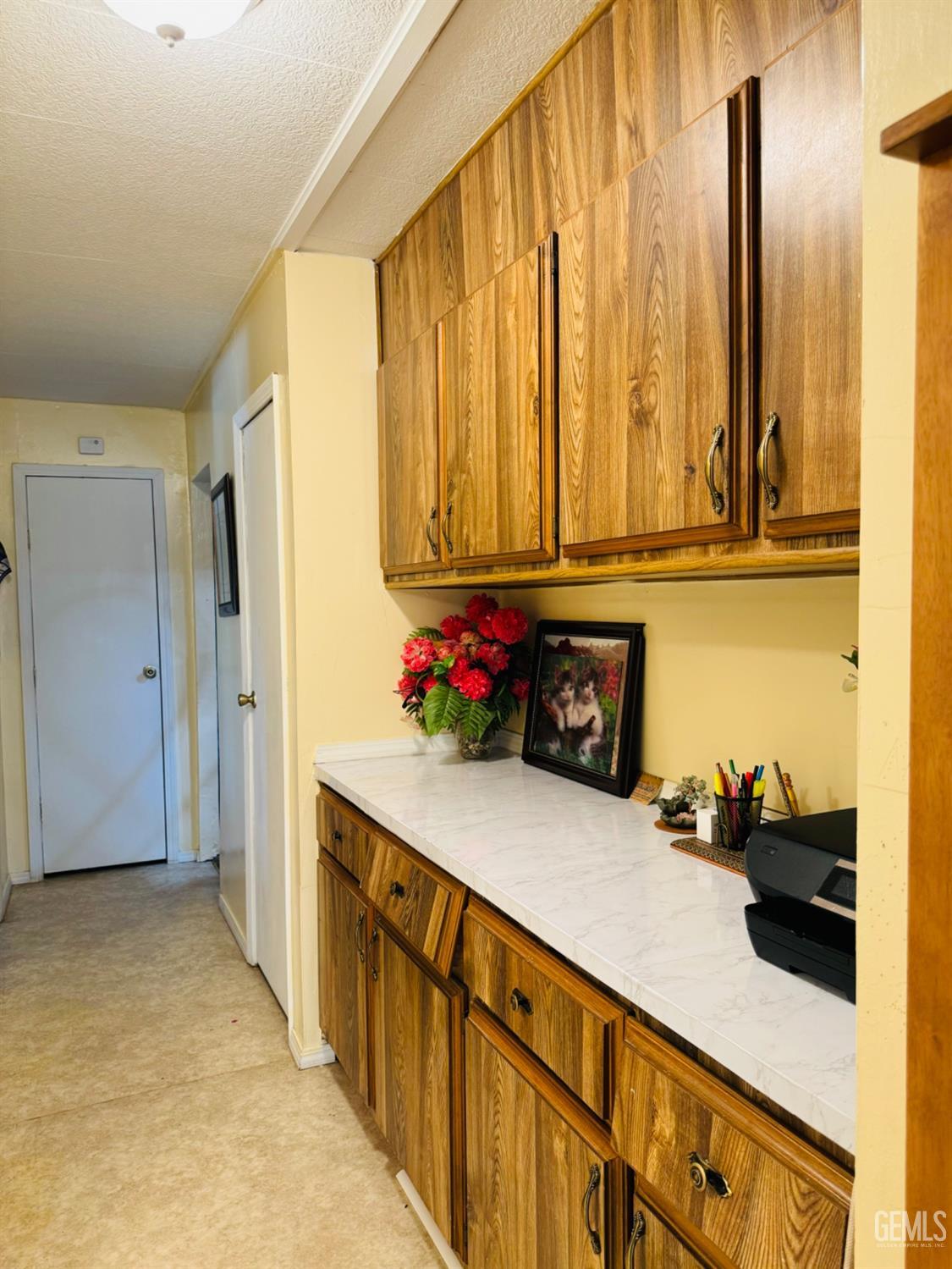 Undisclosed Address Bakersfield, CA 93313 - Photo 22 of 32 a kitchen with stainless steel appliances a counter top space and cabinets