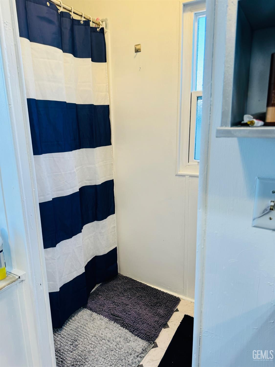 Undisclosed Address Bakersfield, CA 93313 - Photo 9 of 32 a view of entry way with wooden floor