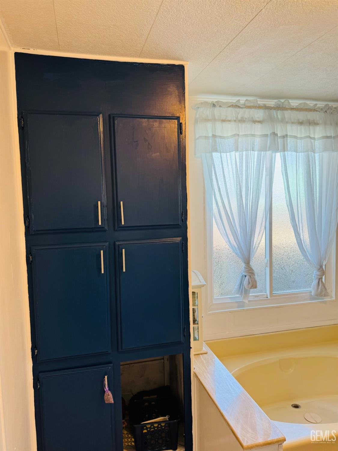 Undisclosed Address Bakersfield, CA 93313 - Photo 10 of 32 a view of walk in closet