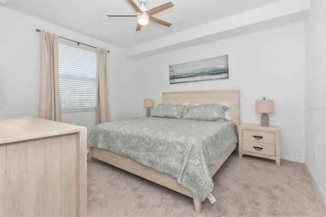 a house with a flower garden in front of it