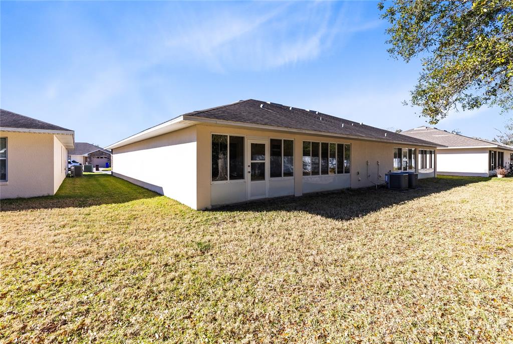 2717 Shelby Ruth Place St. Cloud, FL 34769 - Photo 24 of 31 a house view with a garden space