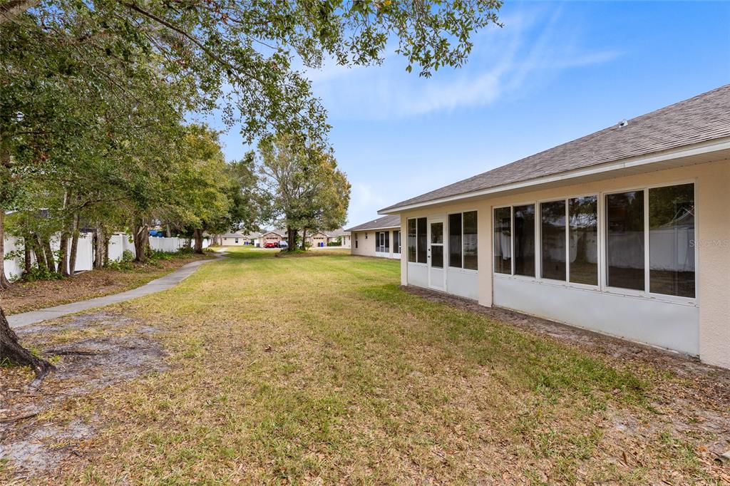 2717 Shelby Ruth Place St. Cloud, FL 34769 - Photo 26 of 31 a view of house with yard