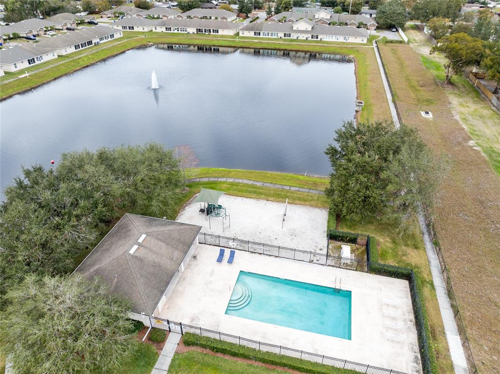 2717 Shelby Ruth Place St. Cloud, FL 34769 - Photo 29 of 31 a view of a swimming pool with a patio