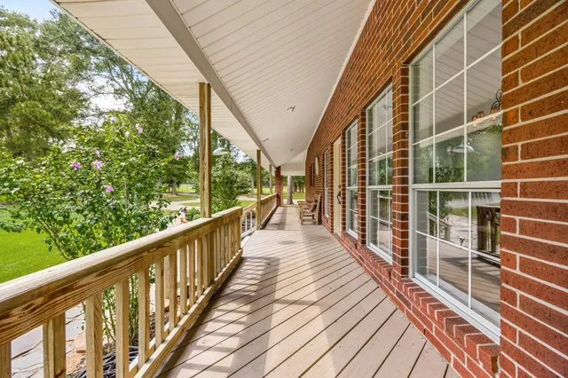 $1,850,000 | 15050 Lake Paula Drive, Willis, TX 77318