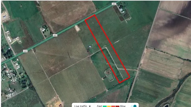 a view of a yard with swimming pool and outdoor seating