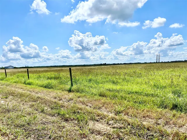 a view of a lake with a big yard