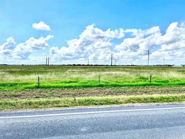 a view of a lake from a yard