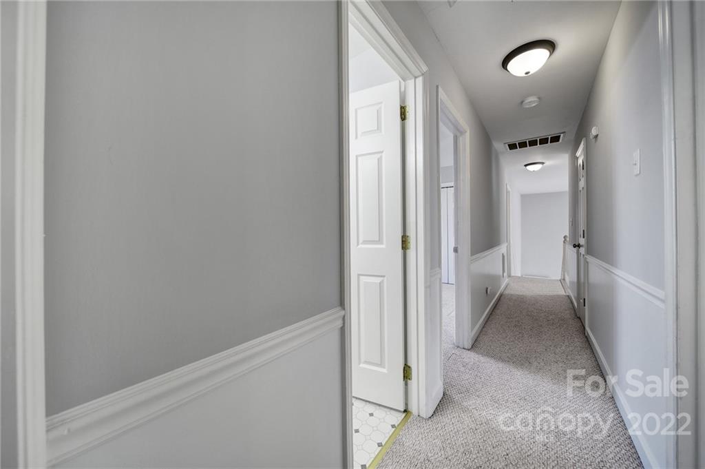 584 Cranborne Chase Fort Mill, SC 29708 - Photo 16 of 36 a view of a hallway with a room