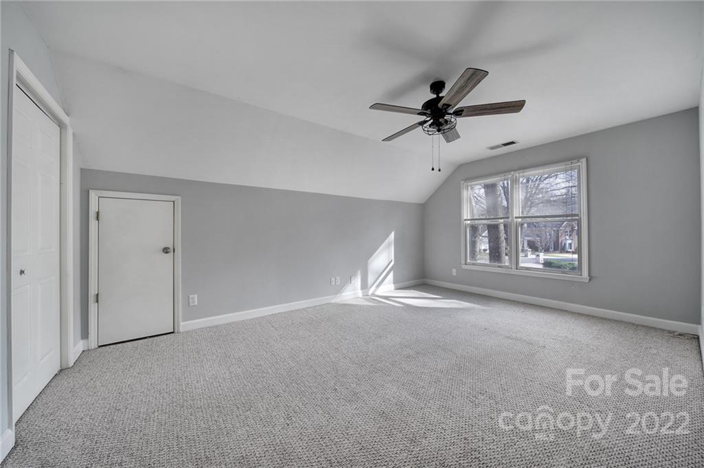 584 Cranborne Chase Fort Mill, SC 29708 - Photo 21 of 36 a view of a livingroom with a ceiling fan and window