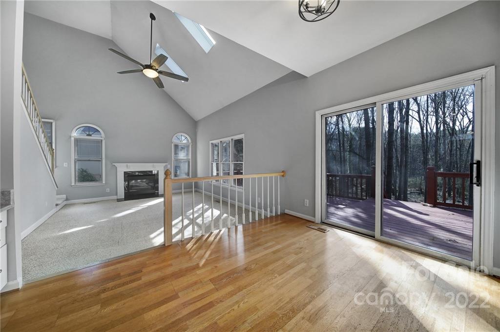 584 Cranborne Chase Fort Mill, SC 29708 - Photo 7 of 36 a view of a livingroom with wooden floor and furniture