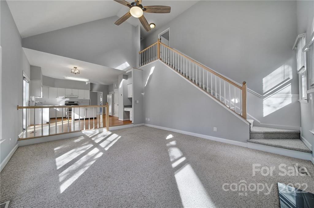 584 Cranborne Chase Fort Mill, SC 29708 - Photo 8 of 36 a view of a hallway with stairs