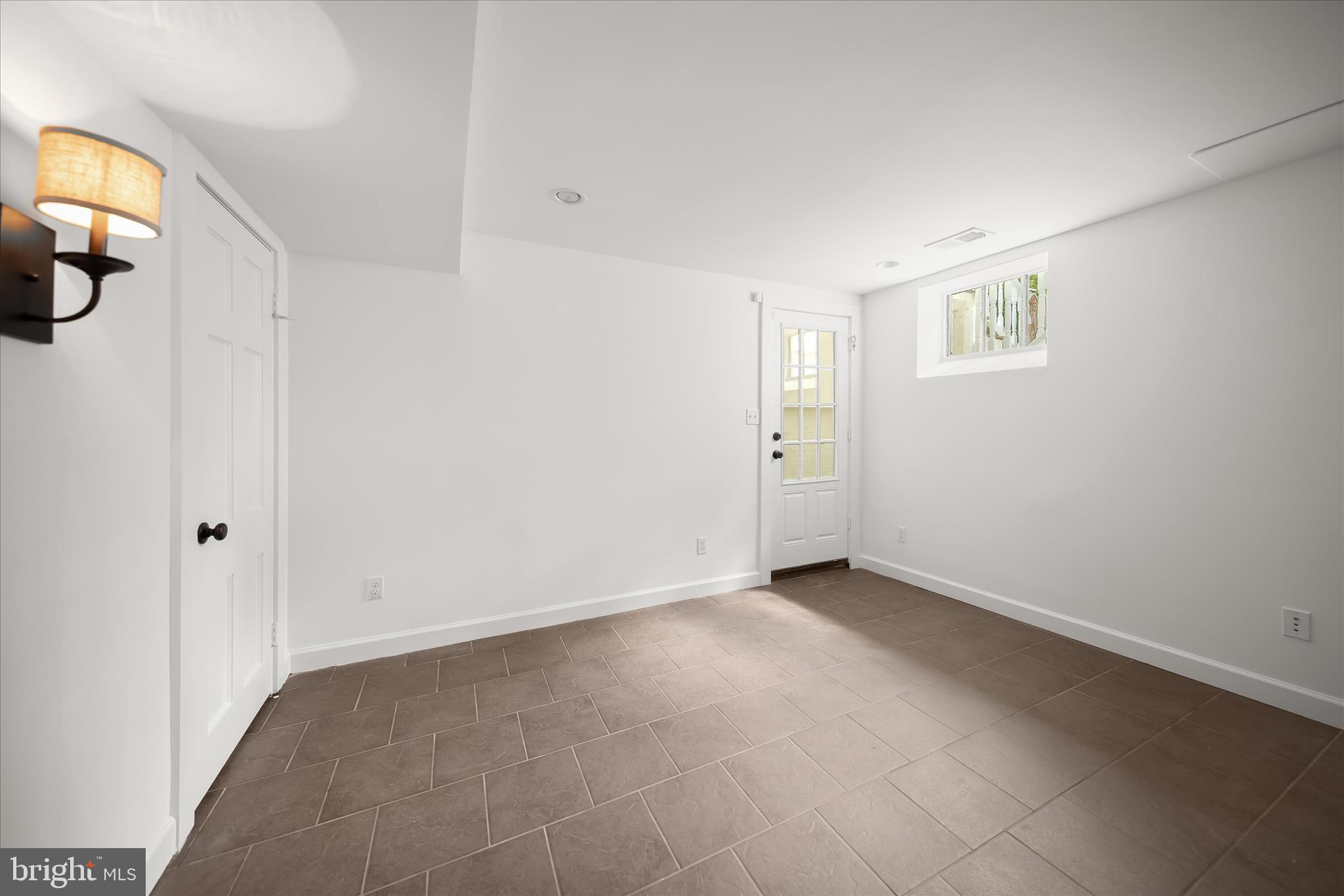 10318 Parkman Road Silver Spring, MD 20903 - Photo 30 of 42 Lower level bedroom w/walkout access to yard