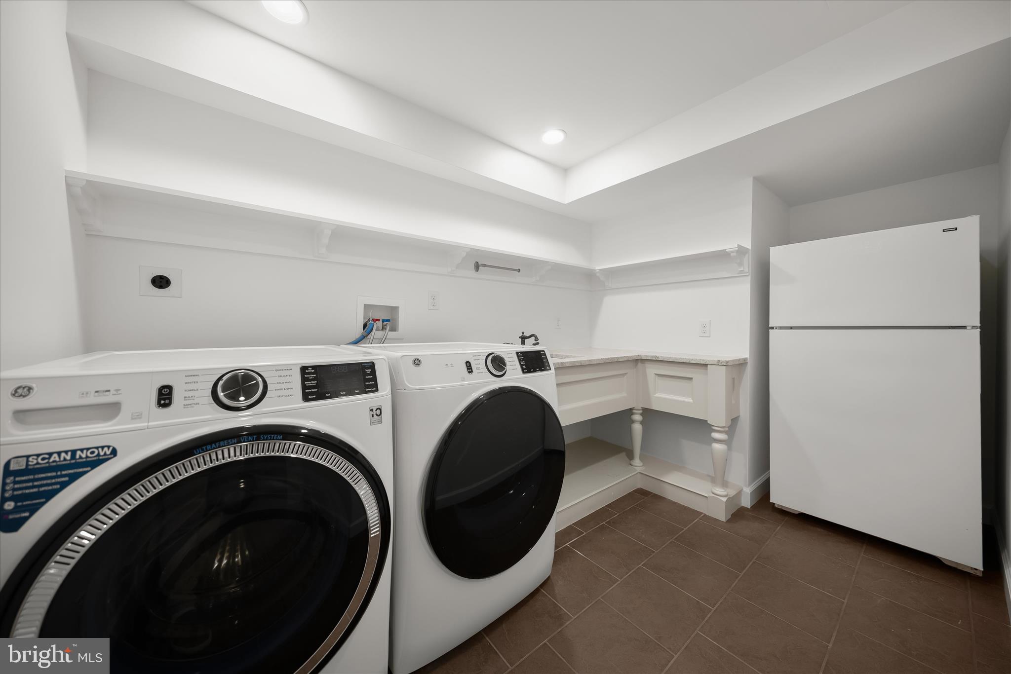 10318 Parkman Road Silver Spring, MD 20903 - Photo 32 of 42 Spacious and bright laundry room w/built-ins