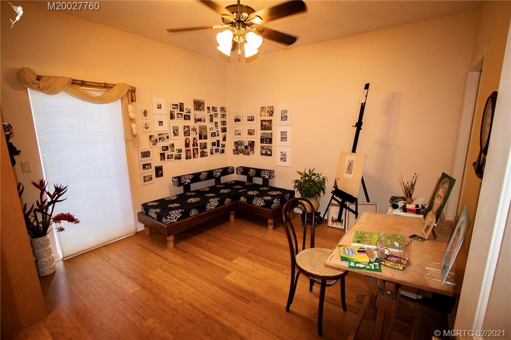 1946 Northwest Fork Road Stuart, FL 34994 - Photo 25 of 32 a room with furniture and wooden floor