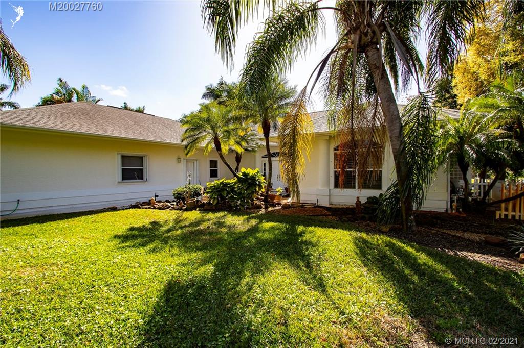 1946 Northwest Fork Road Stuart, FL 34994 - Photo 4 of 32 a view of a house with swimming pool