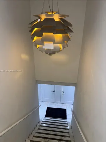 a bathroom with a sink and cabinets