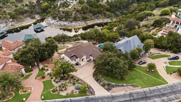 an aerial view of residential house with outdoor space