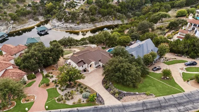 an aerial view of residential house with outdoor space