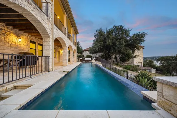 a view of building with a garden