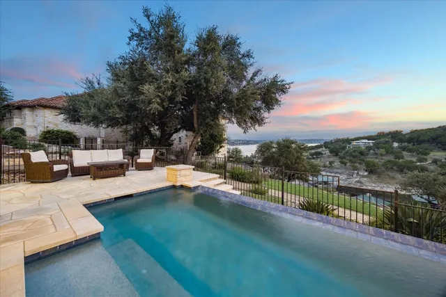 a view of a building with a swimming pool