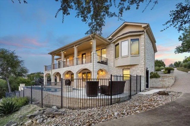 a front view of a house with garage