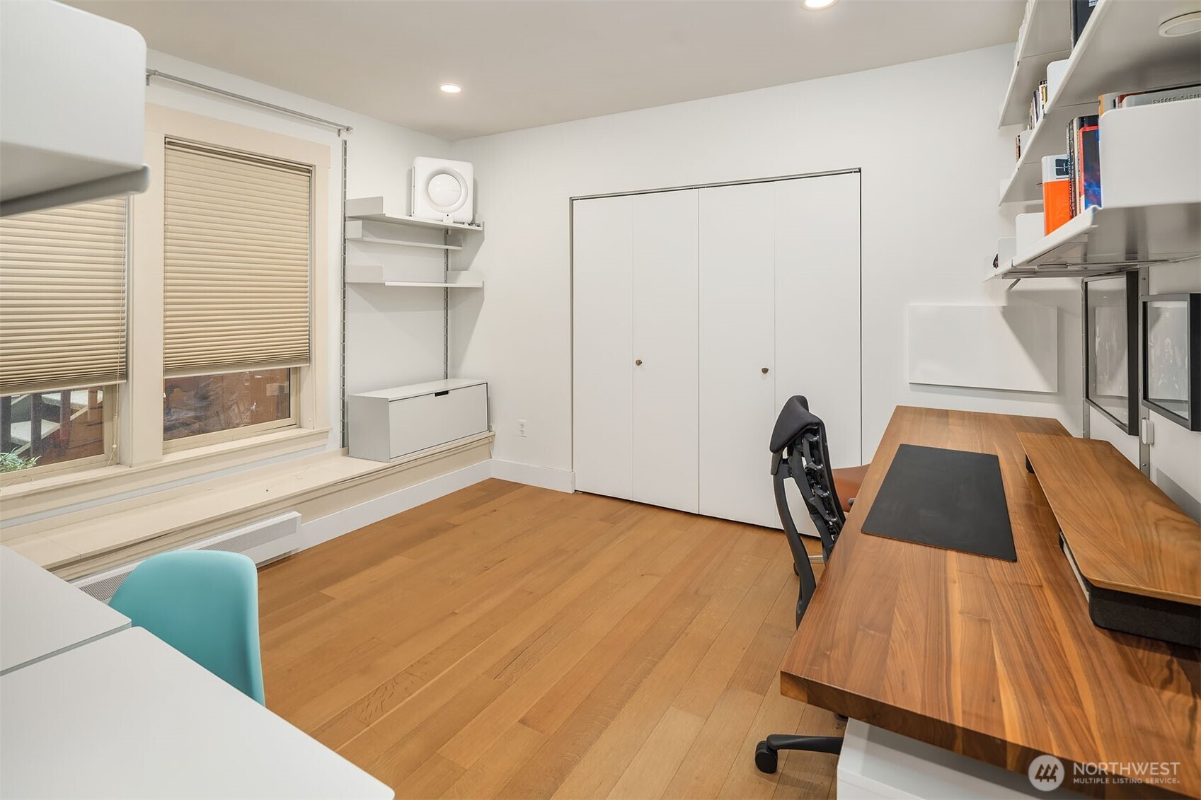 107 23rd Avenue, Unit A Seattle, WA 98122 - Photo 14 of 29 a view of a room with gym equipment