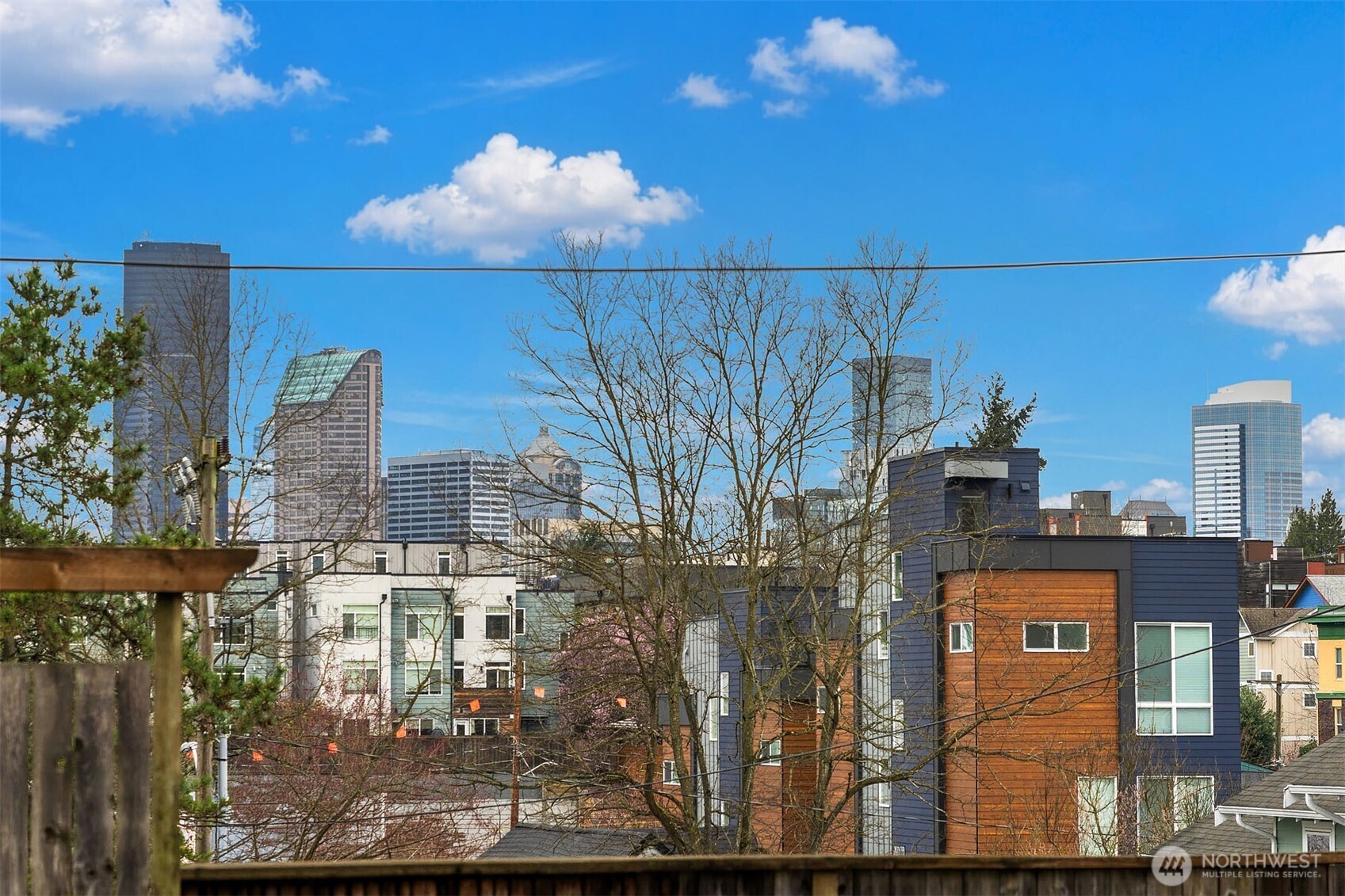 107 23rd Avenue, Unit A Seattle, WA 98122 - Photo 18 of 29 a city view with tall buildings