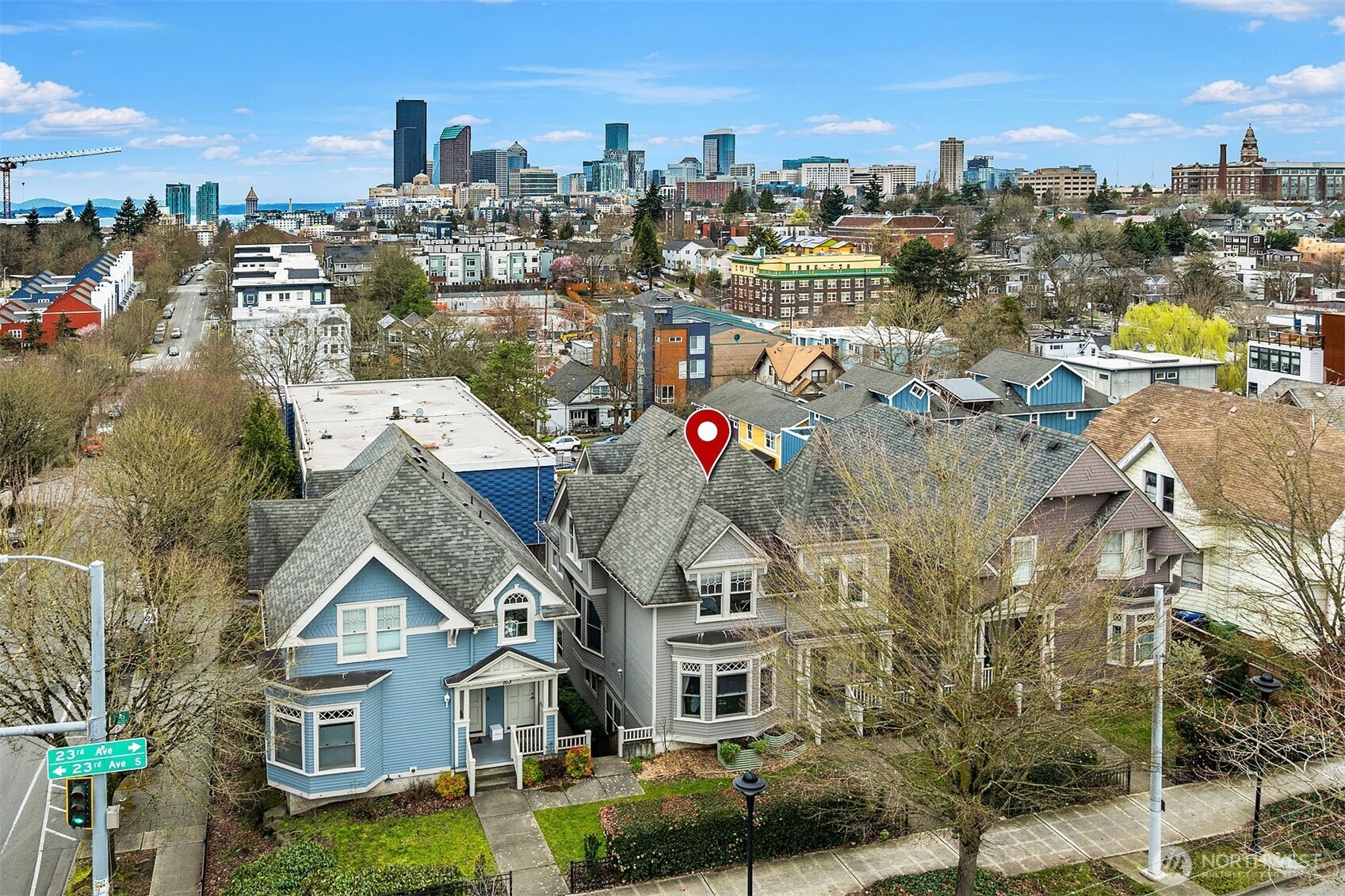 107 23rd Avenue, Unit A Seattle, WA 98122 - Photo 23 of 29 a front view of a house with a garden
