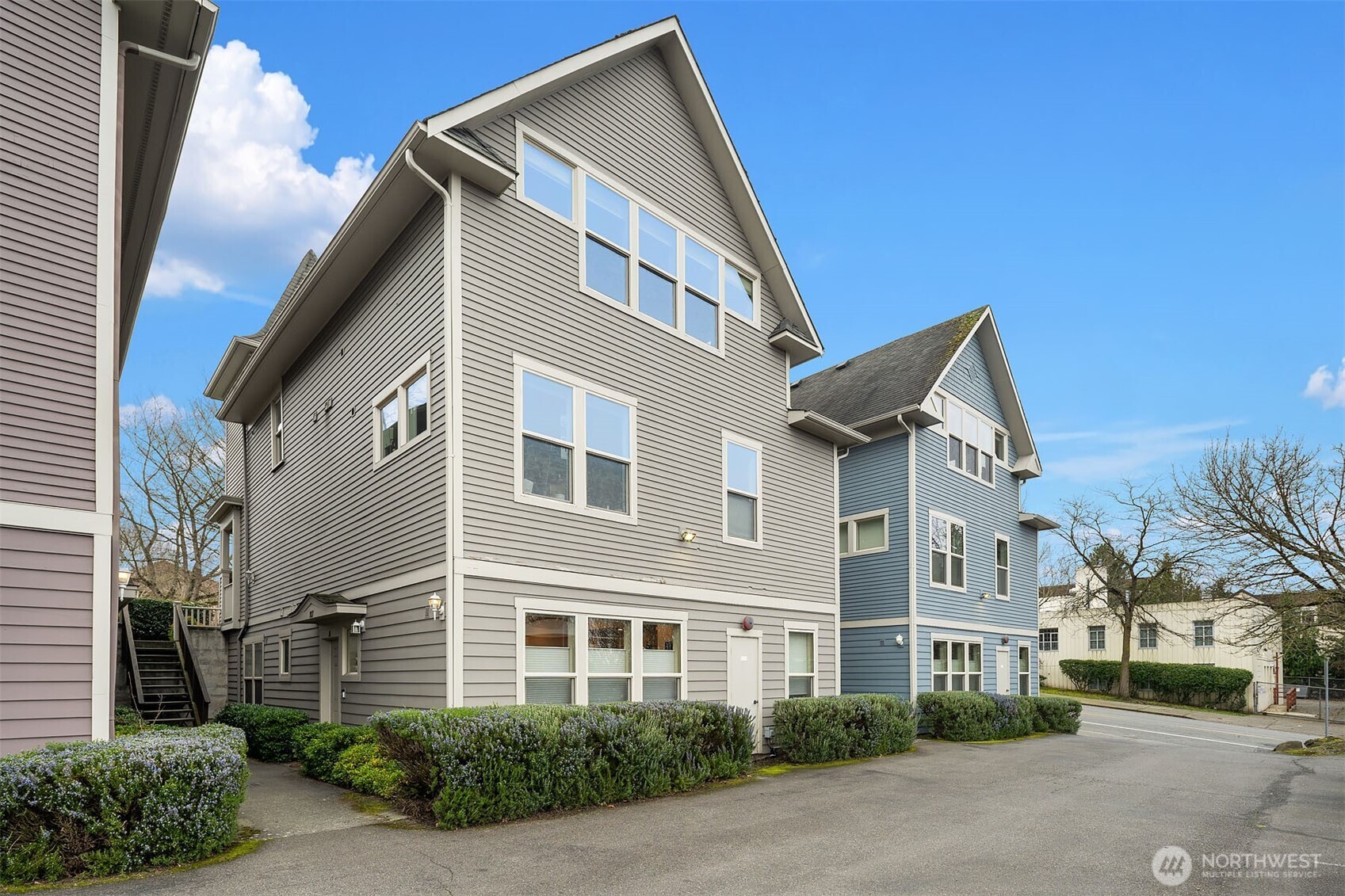 107 23rd Avenue, Unit A Seattle, WA 98122 - Photo 28 of 29 a front view of a house with a yard