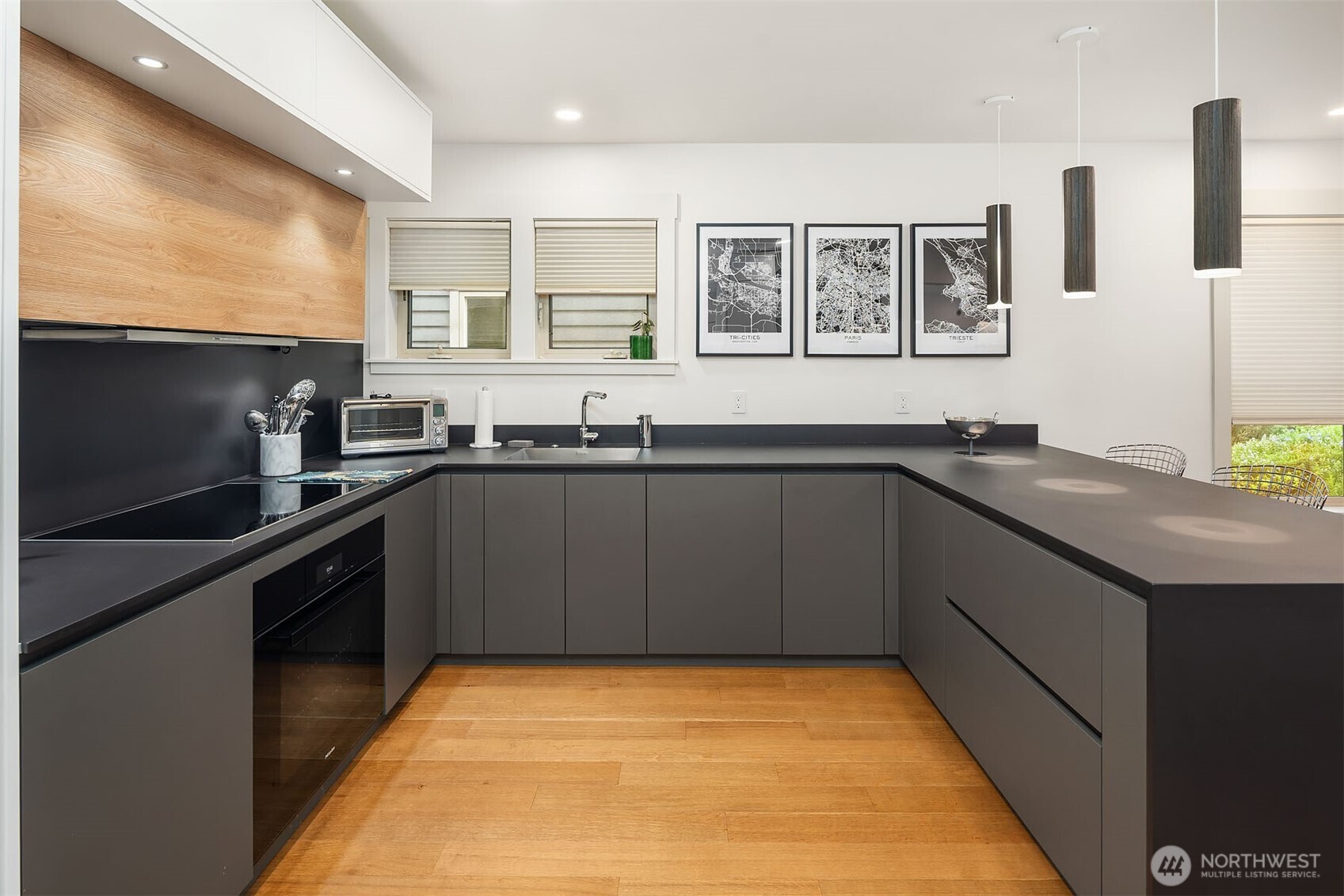 107 23rd Avenue, Unit A Seattle, WA 98122 - Photo 8 of 29 a kitchen with a sink and cabinets