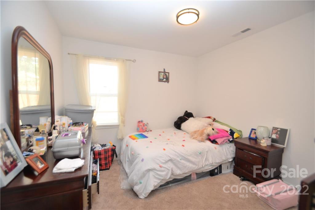 1701 Springdale Road Lancaster, SC 29720 - Photo 6 of 8 a bedroom with a bed and a window