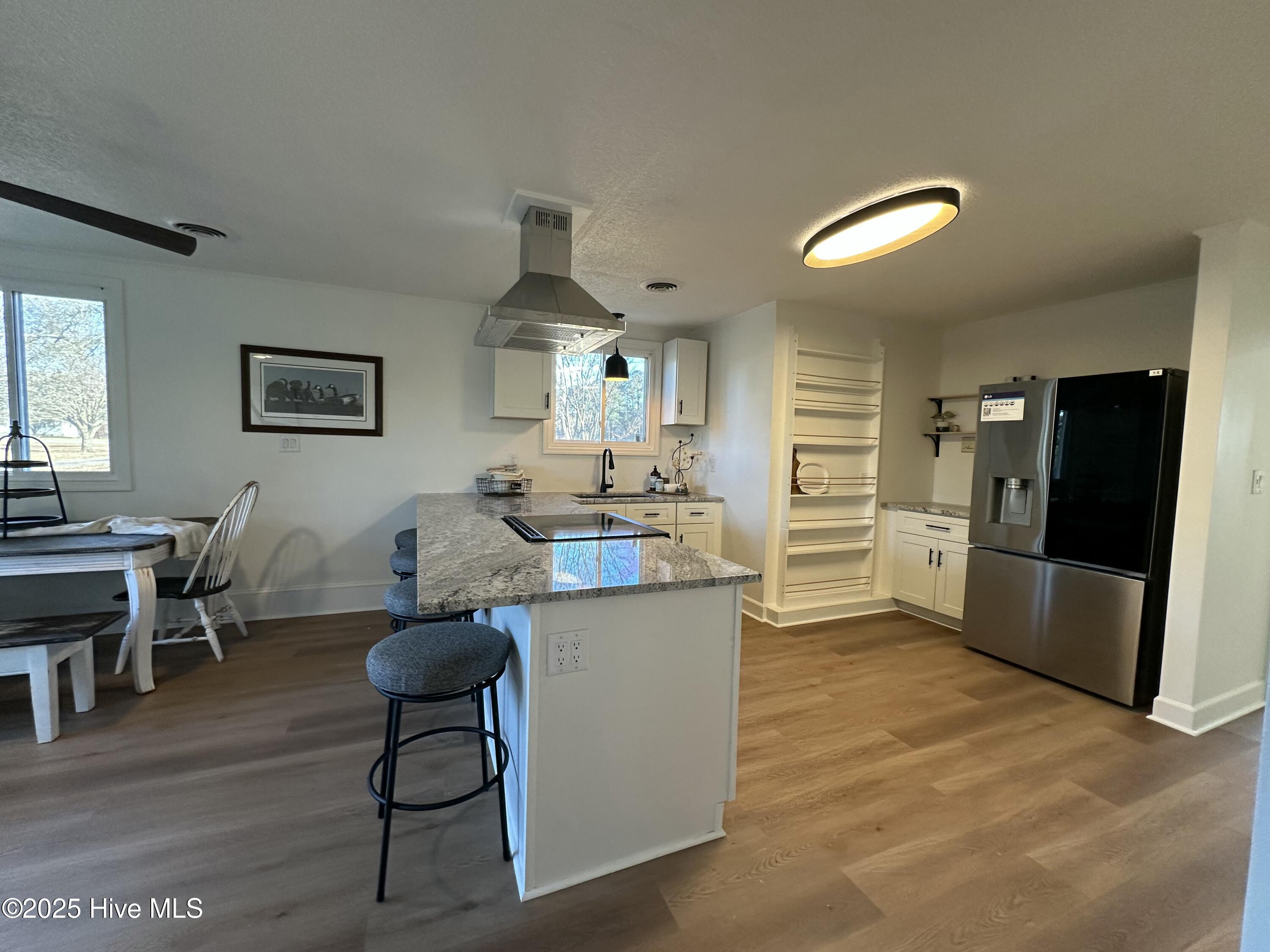 111 Asbury Road Cove City, NC 28523 - Photo 29 of 52 Dining/kitchen from M. closet