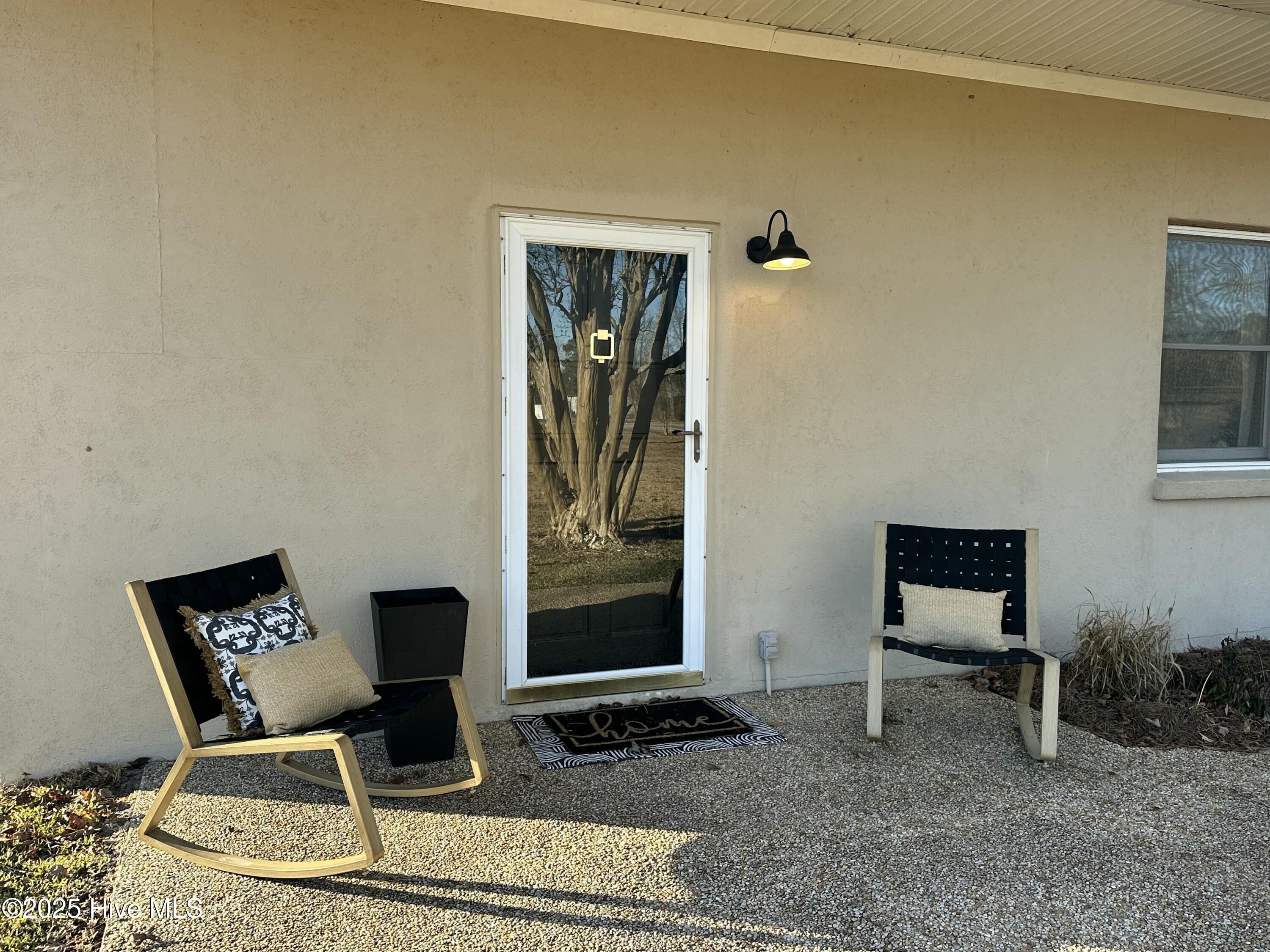 111 Asbury Road Cove City, NC 28523 - Photo 46 of 52 Patio area outside of living room