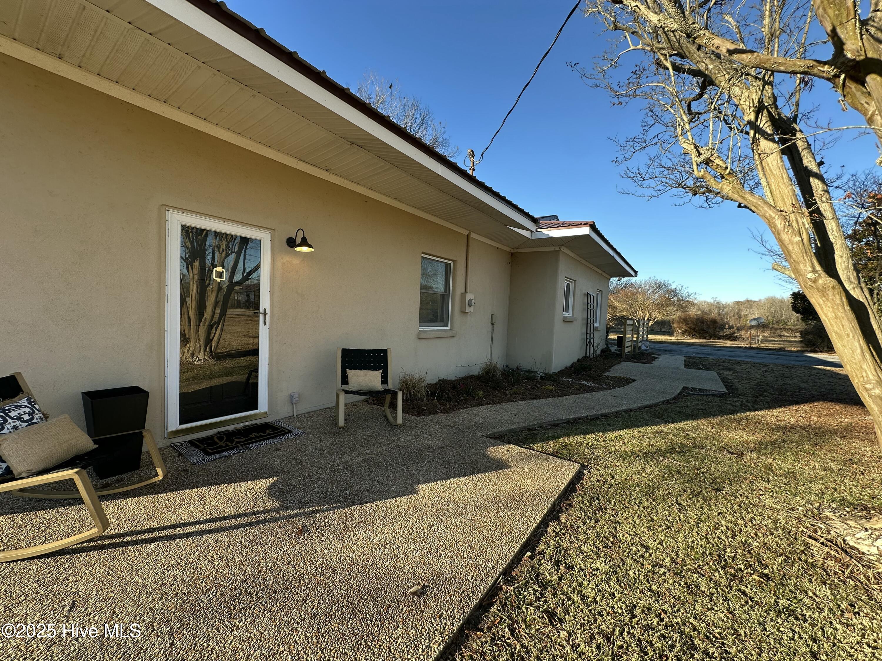 111 Asbury Road Cove City, NC 28523 - Photo 47 of 52 Patio area towards driveway