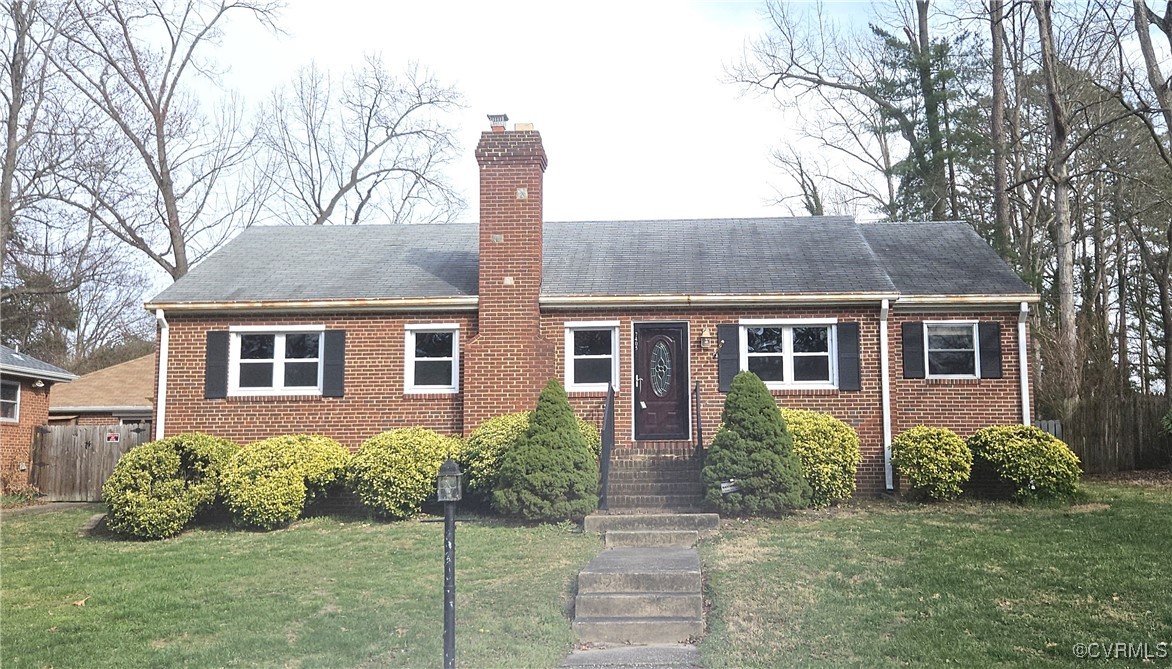7405 Biscayne Road Henrico, VA 23294 - Photo 1 of 1 a front view of a house with a yard