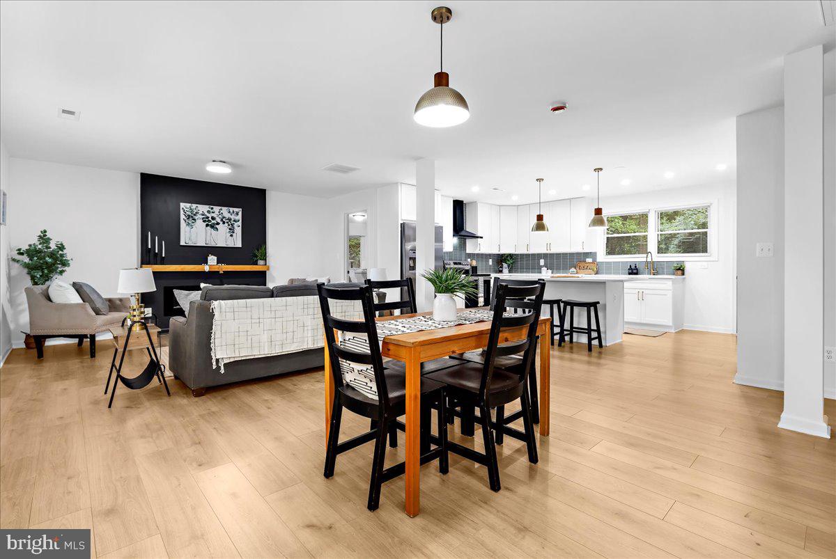 624 Sutton Drive Pasadena, MD 21122 - Photo 14 of 64 a view of a dining room with furniture