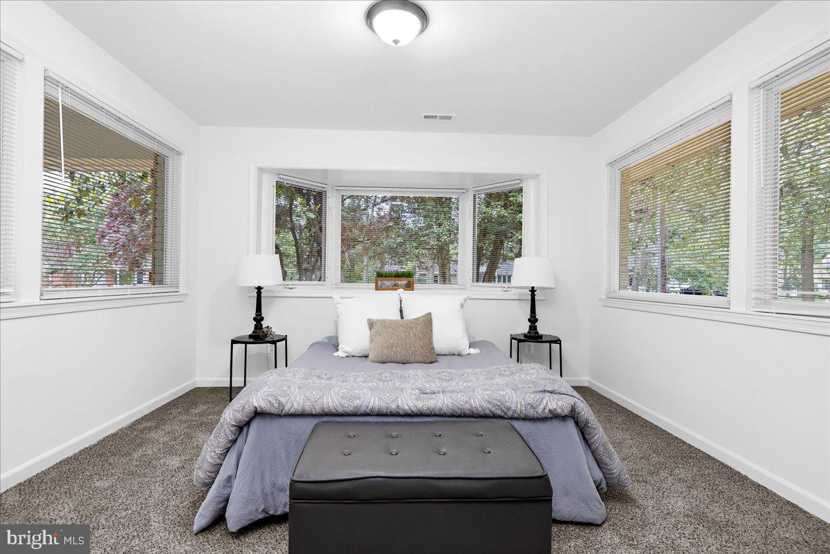 624 Sutton Drive Pasadena, MD 21122 - Photo 22 of 64 a living room with furniture and windows