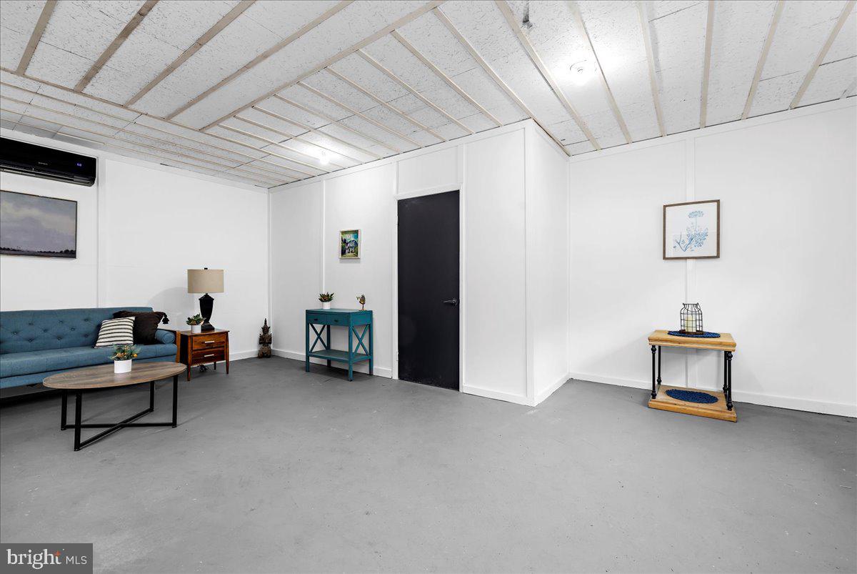 624 Sutton Drive Pasadena, MD 21122 - Photo 36 of 64 a view of a livingroom with furniture and a couch