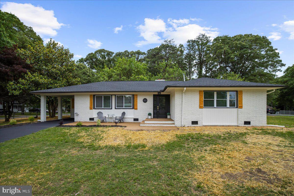 624 Sutton Drive Pasadena, MD 21122 - Photo 40 of 64 a house that has a big yard in front of it
